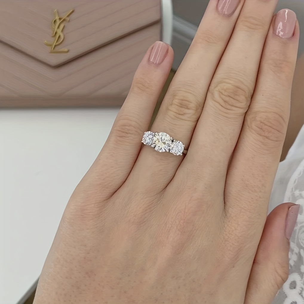Women's 2/4 Carat Round Moissanite Three Stone Engagement Ring